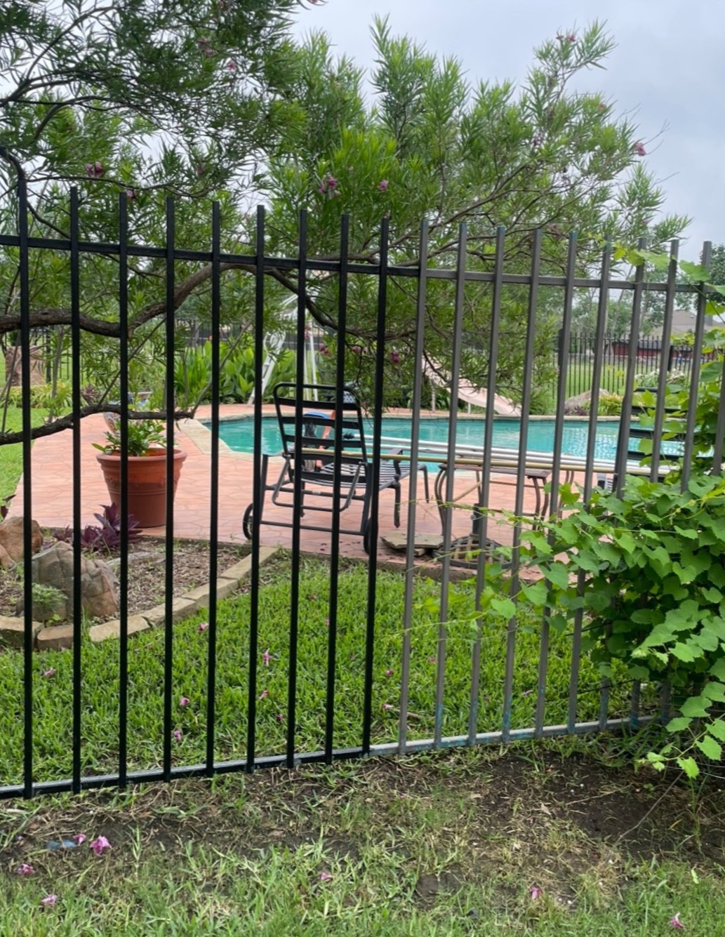 Close up of restored fence post and latch